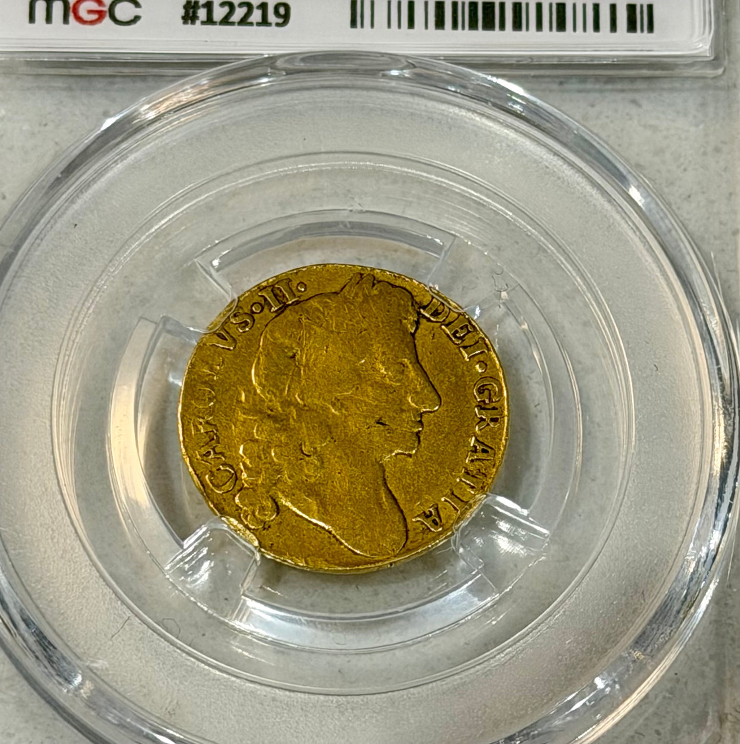 1680 Charles II 2nd Bust Half Guinea Graded VF35 by MGC, approx 4.2g of 22ct Gold