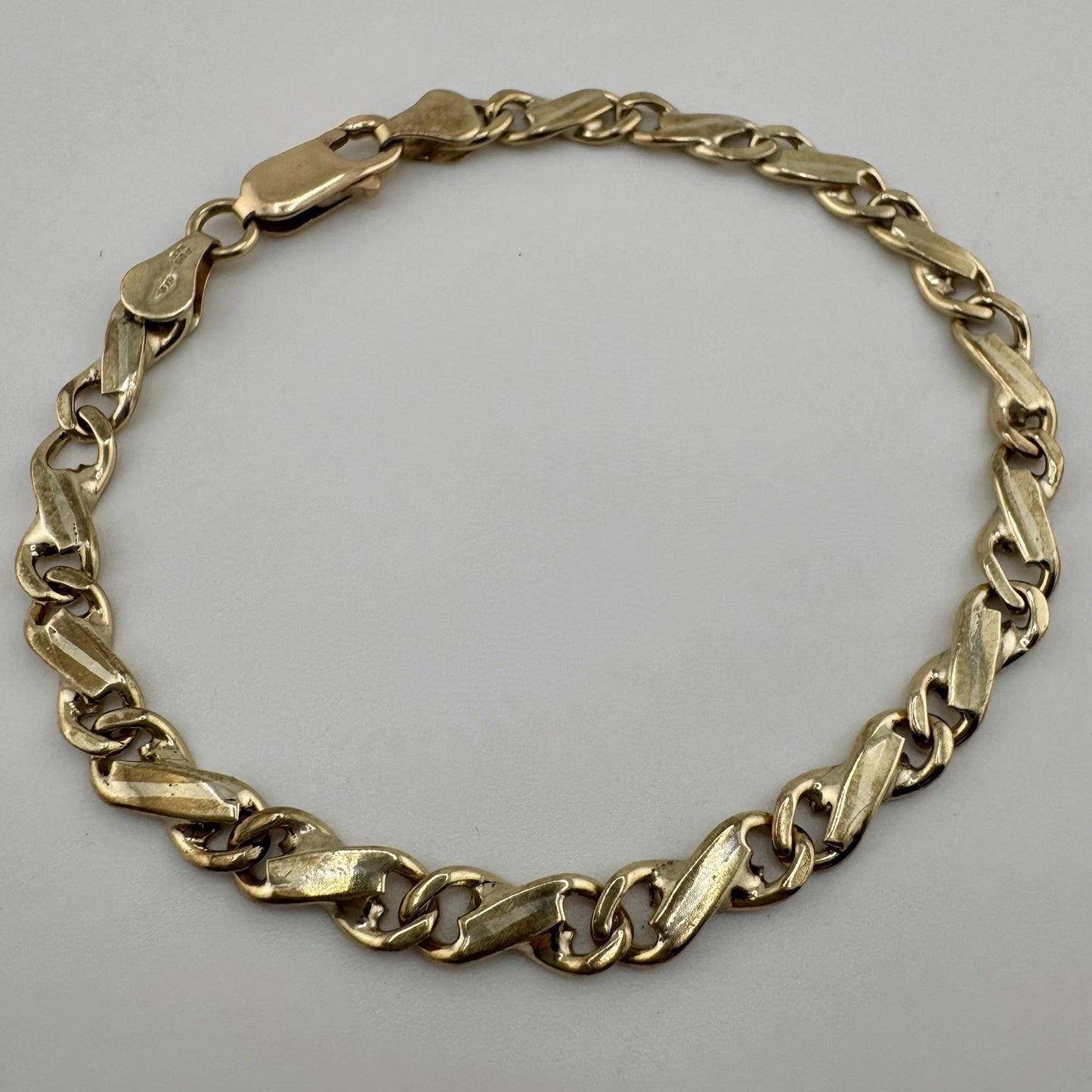 9ct Gold Celtic Link Bracelet, 5.2mm W, 7.25in L, 9.5g Hallmarked